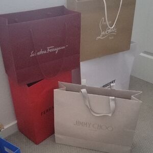 Jimmy Choo, Loubotin, Ferragamo, Burberry shopping bags